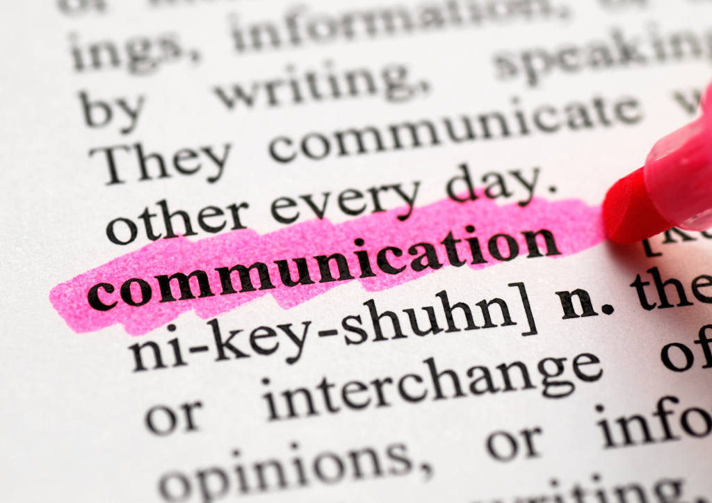 Dictionary entry for the word "communication" highlighted in pink